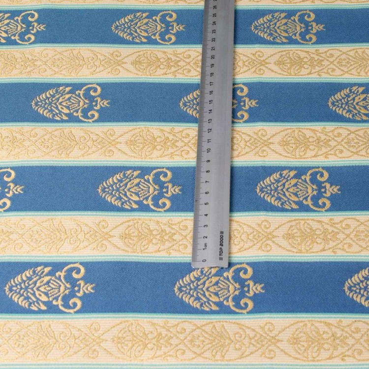 Tkanina tapicerska Vega niebieska– szerokość pasów pokazana na miarce