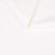 Zbliżenie na strukturę białej ekoskóry tapicerskiej Akropol 1000
