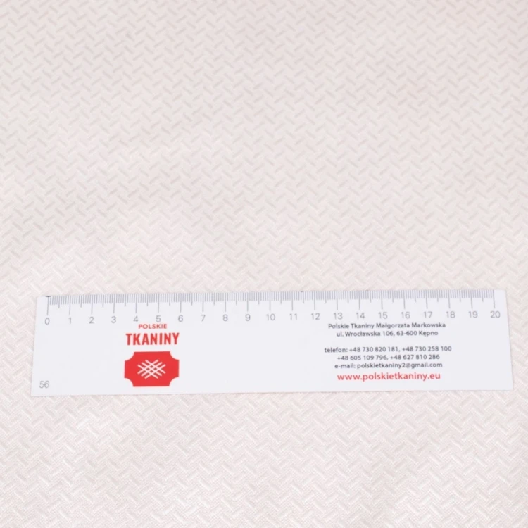 Zbliżenie na białą tkaninę anti-slip o szerokości 210 cm